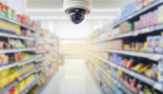 cctv security camera operating in retail store protection blur background